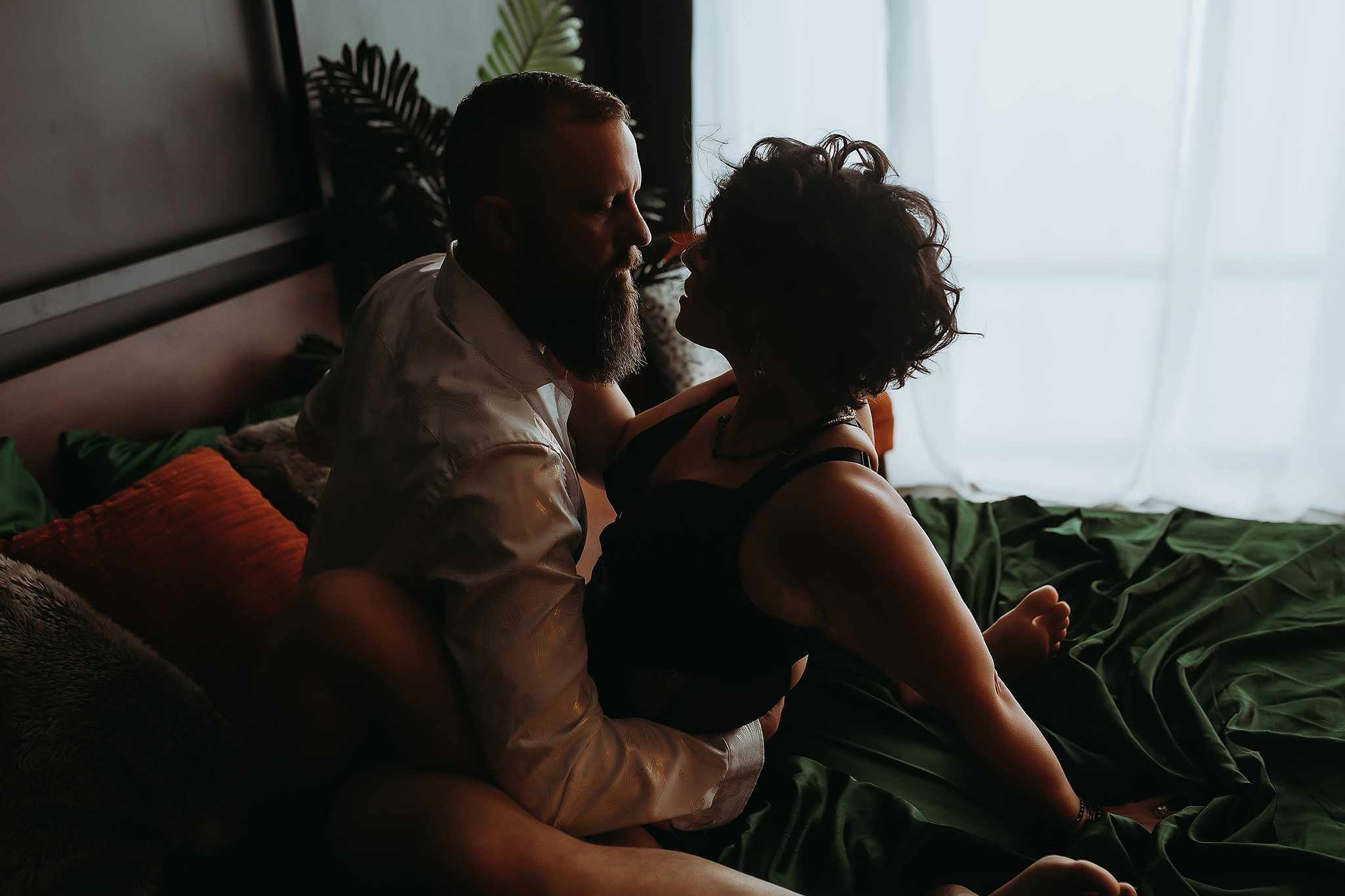 wedding bridal couple boudoir photography shoot laying on bed